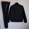RM Chandal Cortavientos Negro 25-26